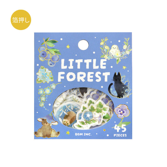 Packaging of 'Little Forest' with illustrations of animals and nature on a blue background