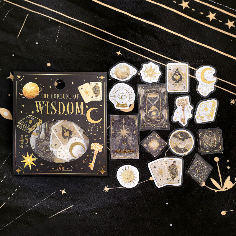 Collection of stickers with 'The Fortune of Wisdom' packaging on a black background.